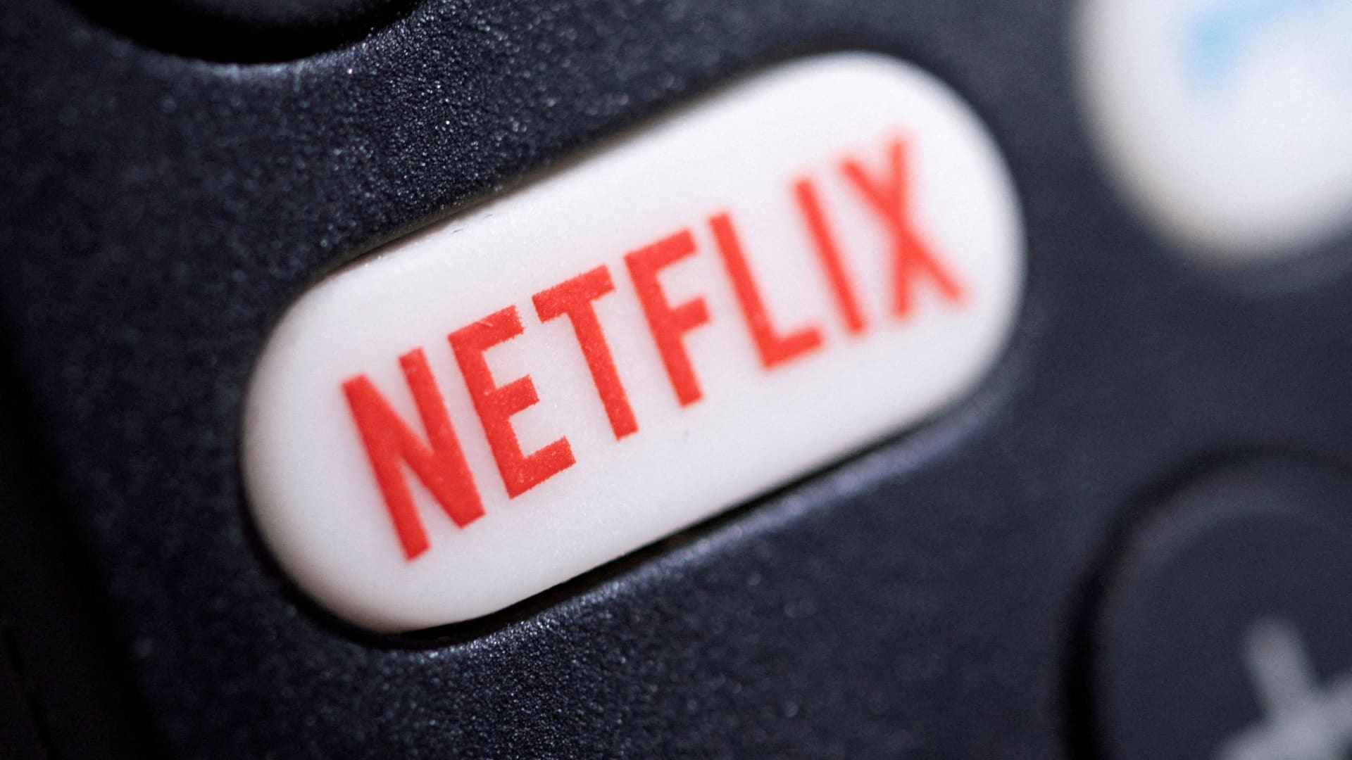 Premarket Movers: Hughes, Schein, Netflix & More